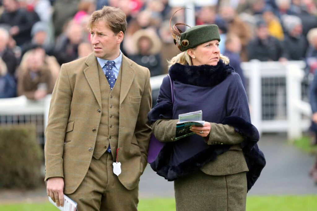 Well dressed couple enjoying day out at Market Rasen Races